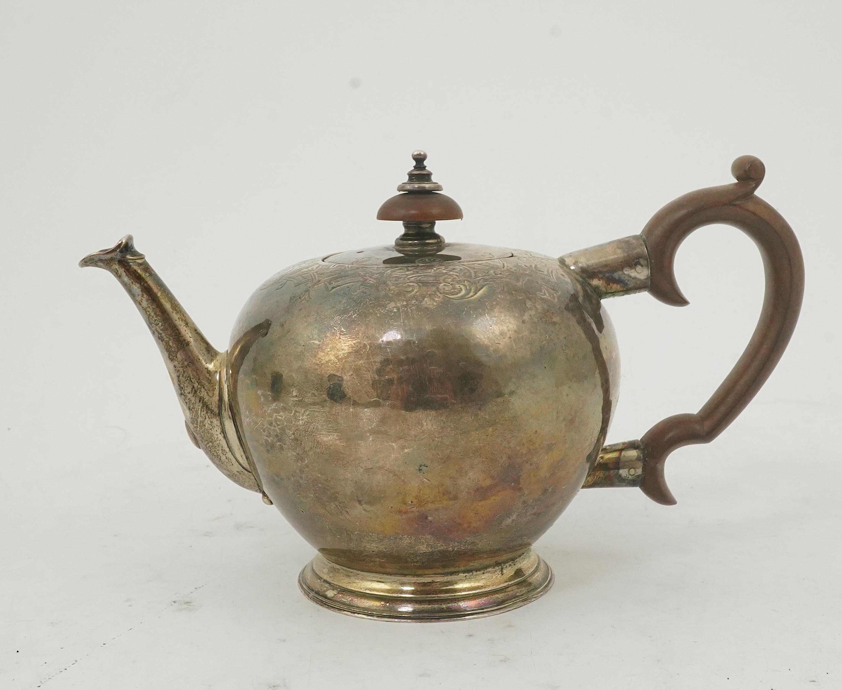 A George II silver bullet shaped teapot, by Thomas Farren